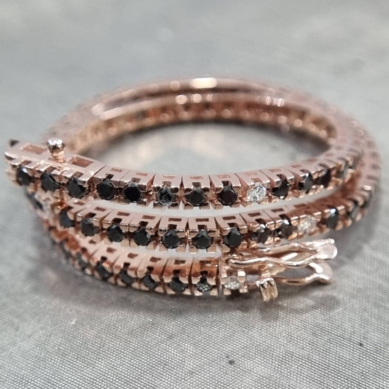 Bracciale Tennis in oro rosa con diamanti neri e bianchi